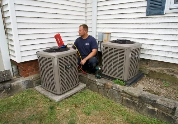 J.J. Sullivan Air Conditioning System service by a professional technician