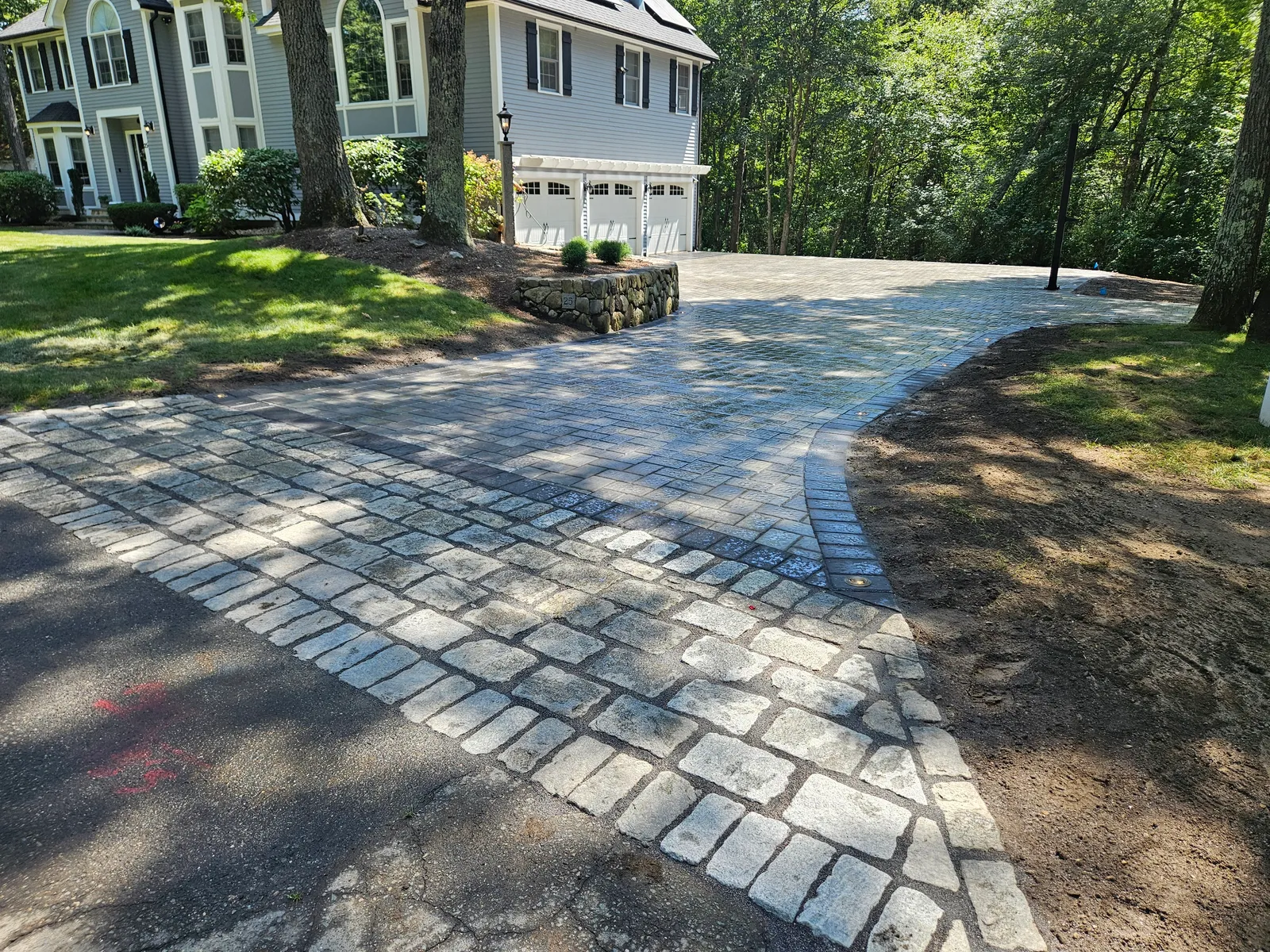 Custom stone patio built by Stiles and Sons in NH Seacoast