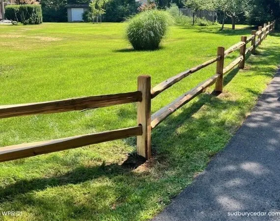 Rustic split rail fence defines property borders in Boxborough,