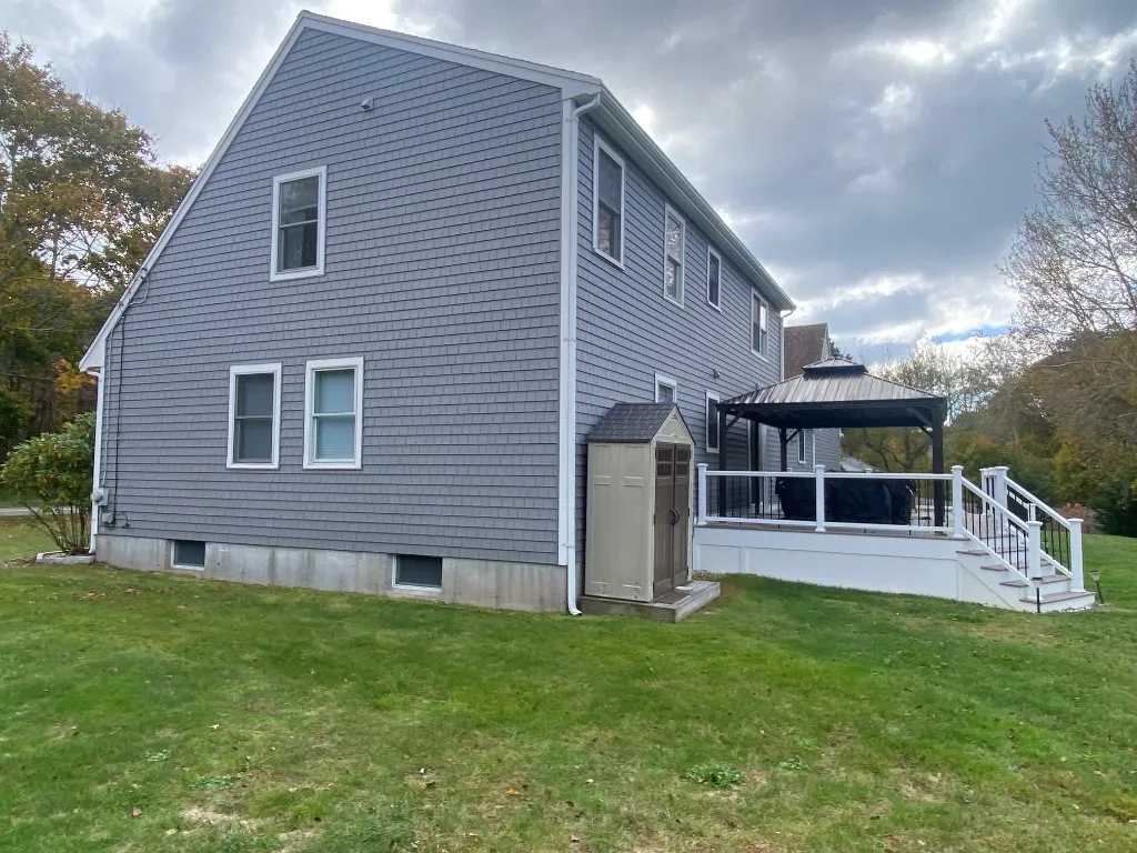 Side exterior with back deck and custom gazebo