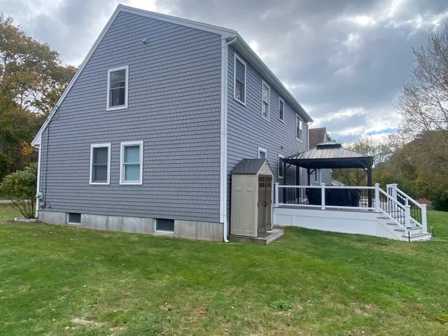 Side exterior with back deck and custom gazebo