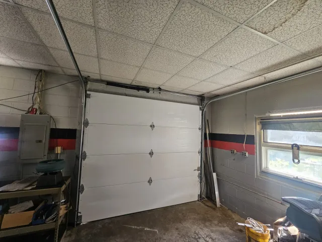 Interior view of a white garage door installation