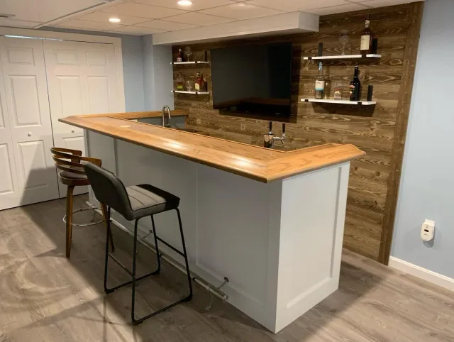 Finally got some photos of this custom bar we built in Groton. It turned into the perfect place to enjoy a brew after work and watch the game! The lighting also makes it a really fun space to hang!!! 
.
.
.
#custom #custombar #bar #beers #beerstagram
