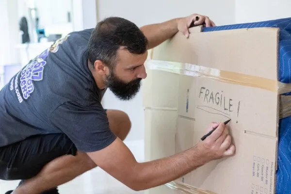 Boston mover packing fragile item