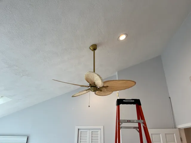 Ceiling fan installation in progress
