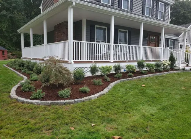Beautifully landscaped front yard by J&M Stone & Garden