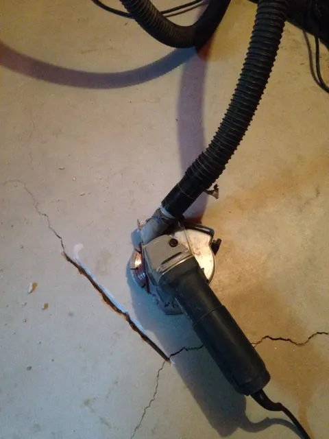 Routing out a cracked concrete slab for repair