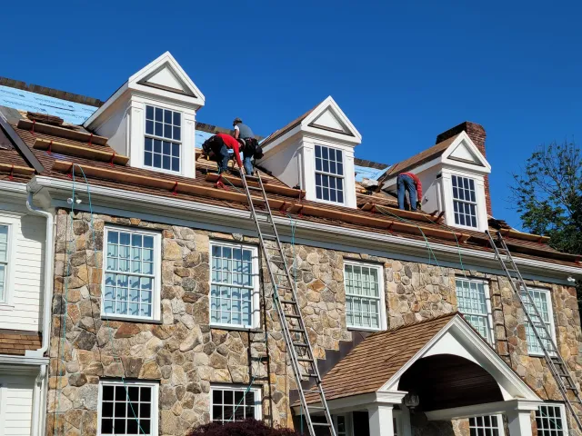 work photo from cedarroofingprotection.com