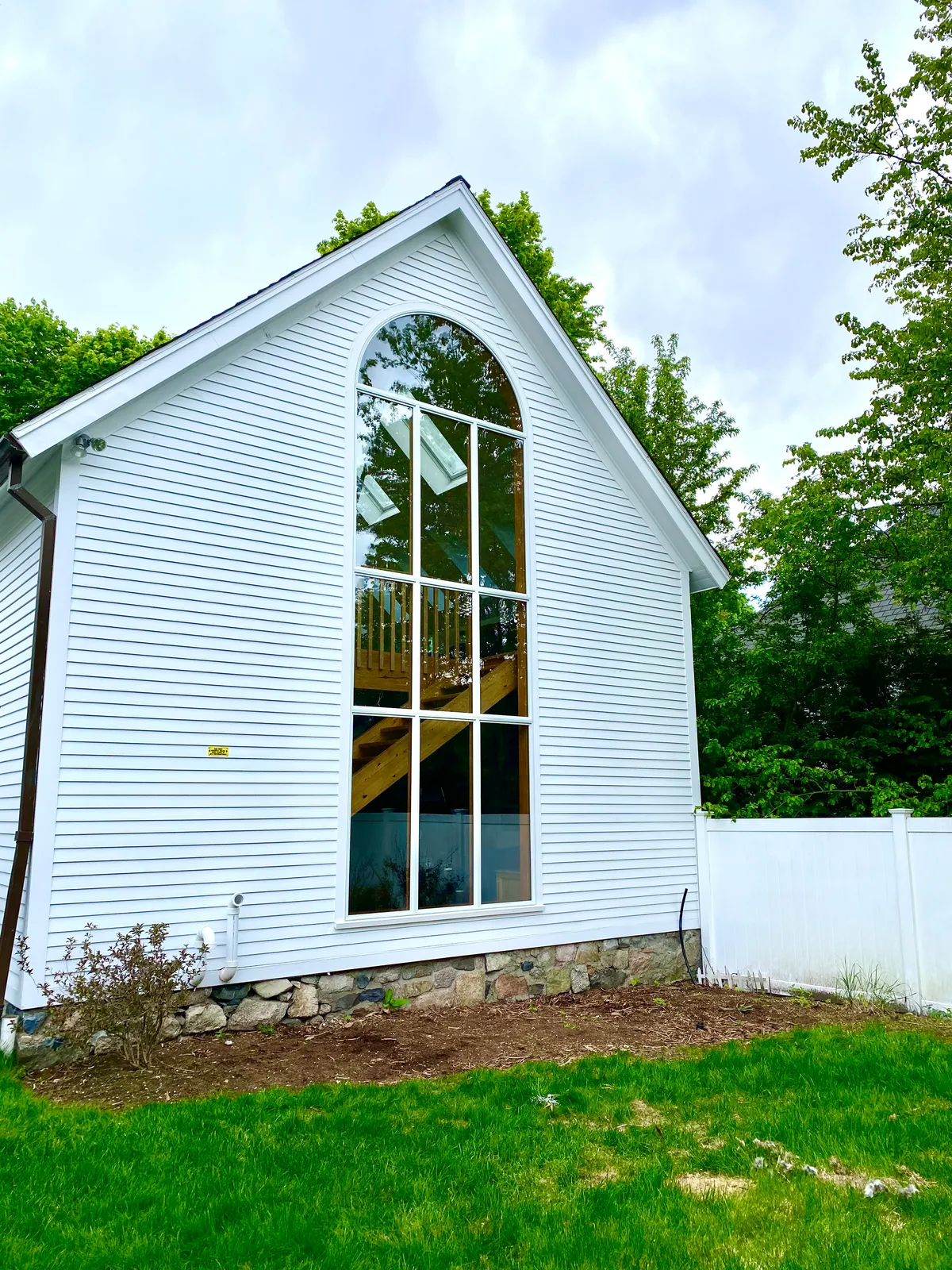 Home addition with arched window