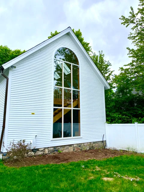 Home addition with arched window