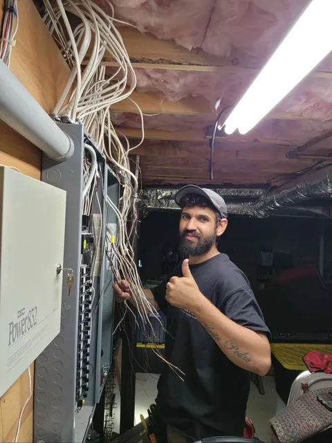 Warley Lima working on a panel
