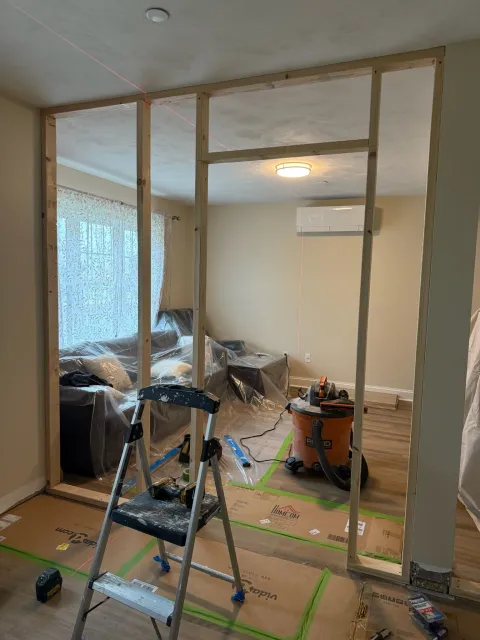 Wall and doorway construction during guest bedroom conversion in Wilmington Massachusetts