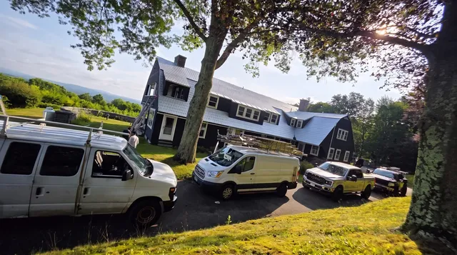 The vans at a farmhouse job