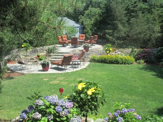 Finished paver patio and landscaped yard